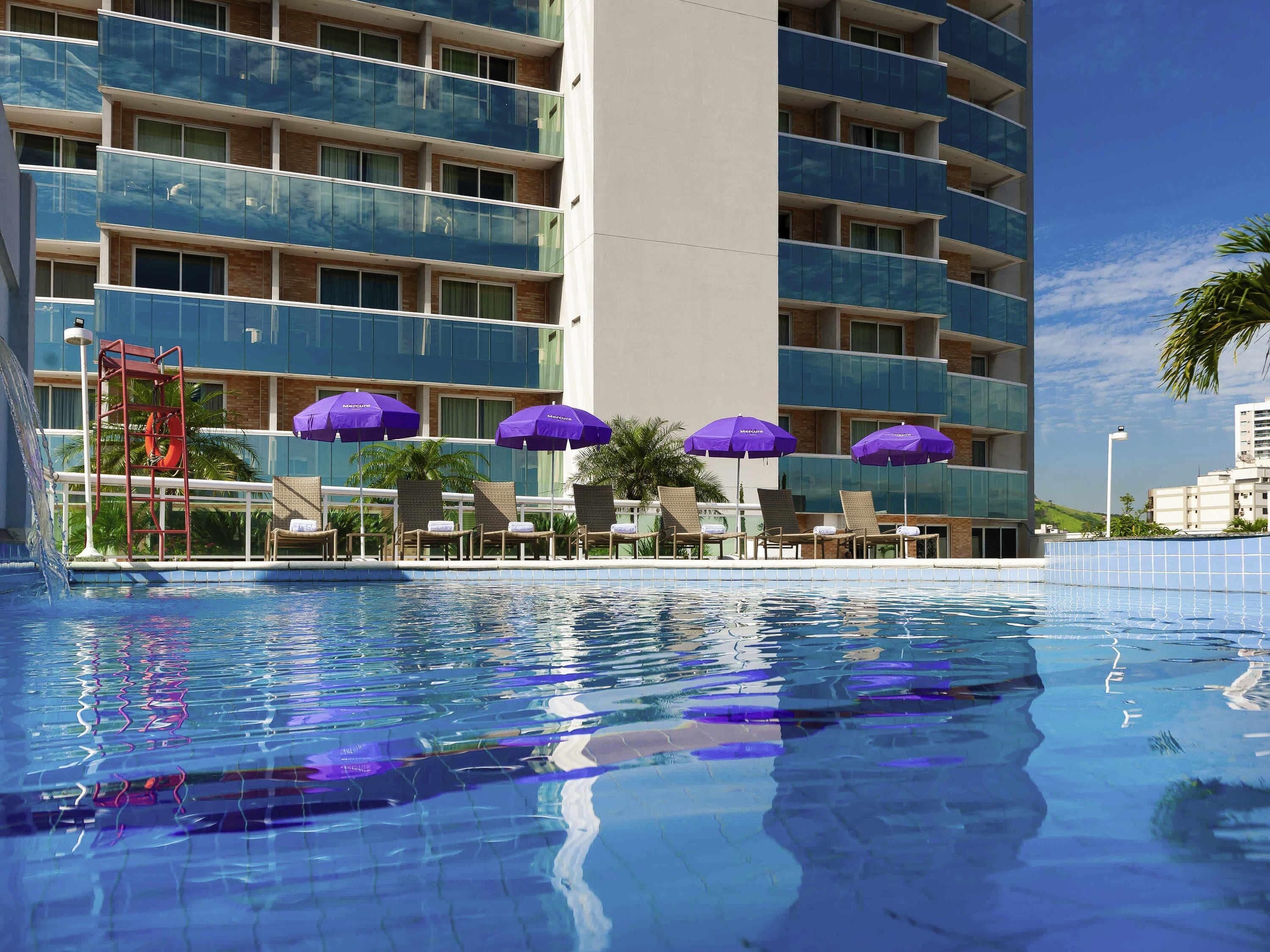 Outdoor pool, open 10:00 AM to 6:00 PM, pool umbrellas, sun loungers