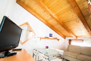 Quadruple Room, 2 Bedrooms, Beachside | Living area | LED TV