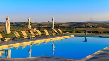 Seasonal outdoor pool, pool umbrellas, sun loungers