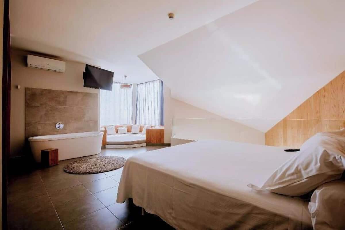 Ropa de cama de alta calidad y minibar