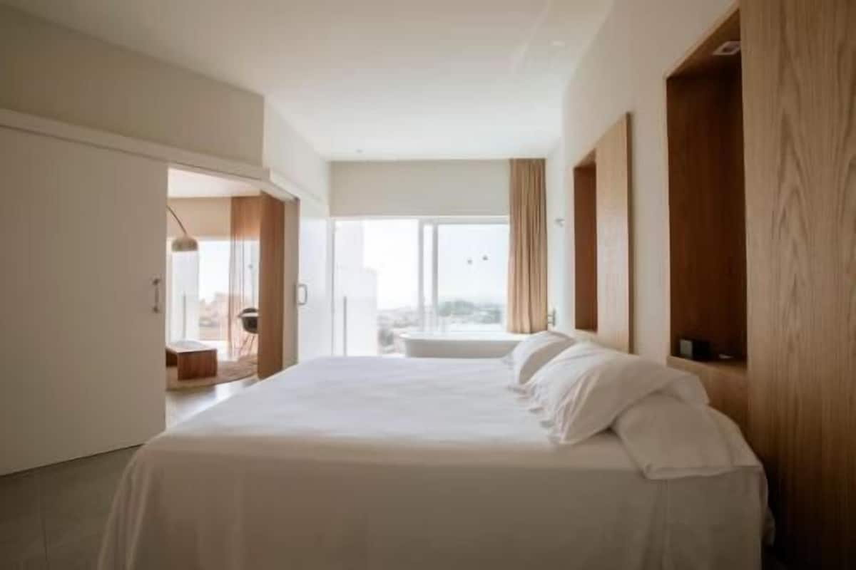 Ropa de cama de alta calidad y minibar