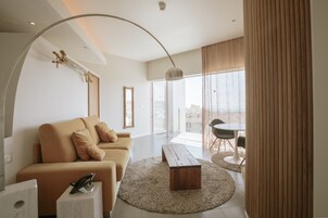 Suite, 1 Bedroom | Living room | LCD TV