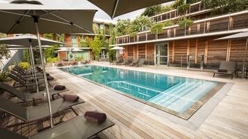 Outdoor pool, open 9:00 AM to 9:00 PM, pool umbrellas, sun loungers