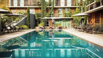 Outdoor pool, open 9:00 AM to 9:00 PM, pool umbrellas, sun loungers