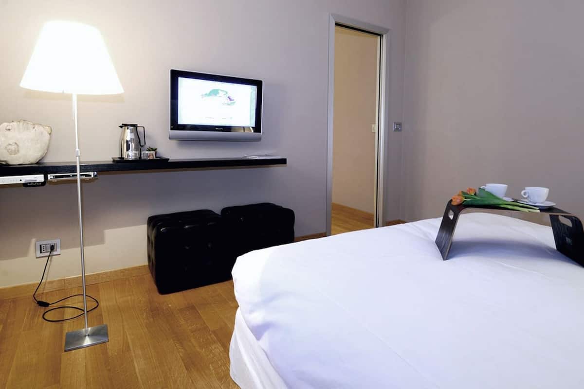 Suite | Italiaanse Frette-lakens, donzen dekbedden, een minibar