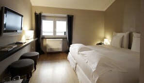 Sábanas italianas Frette, cubrecamas y minibar 
