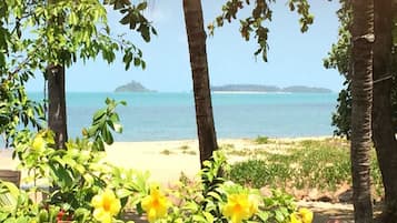 On the beach, sun loungers, beach towels