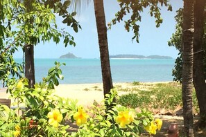 On the beach, sun loungers, beach towels