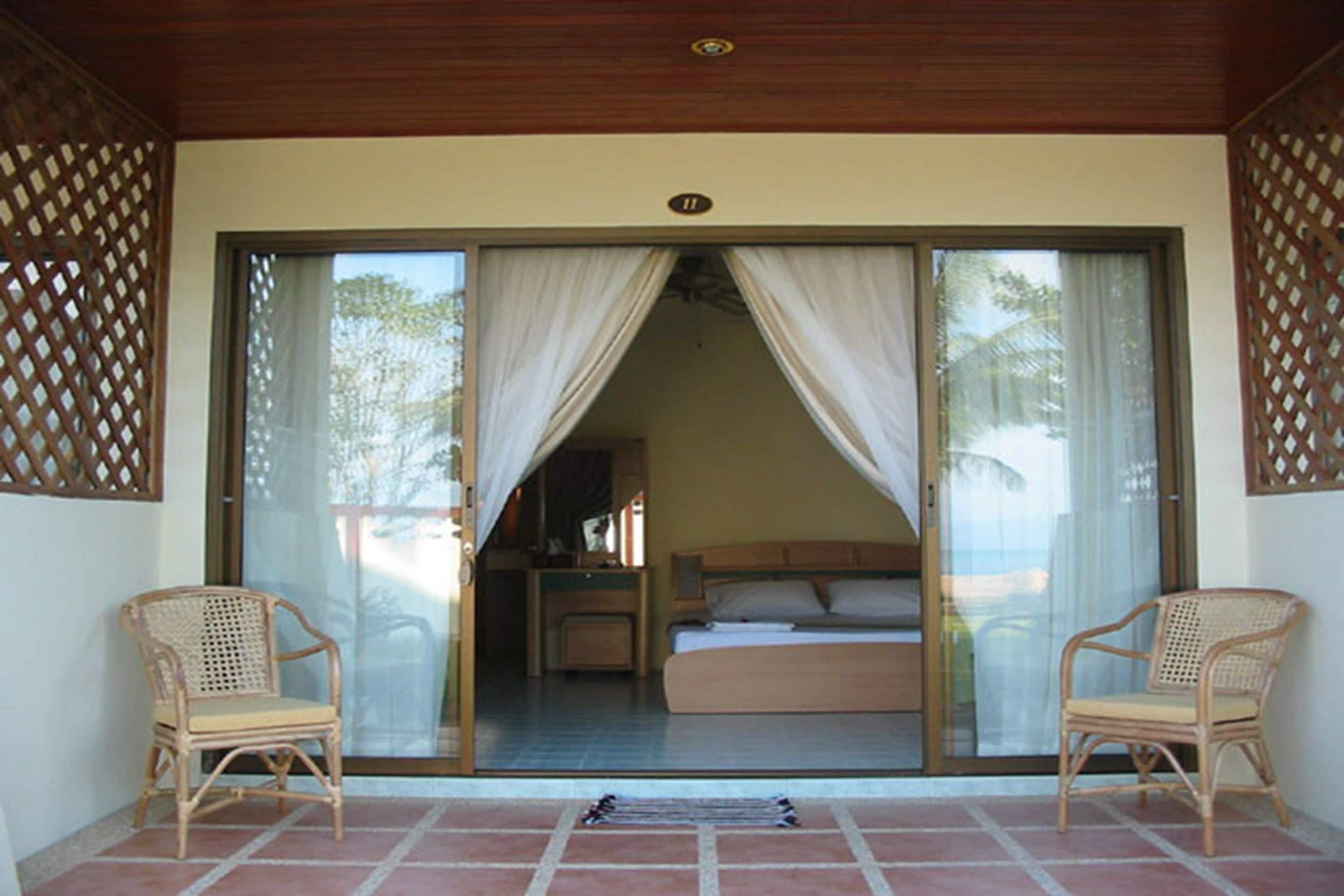 deluxe double room, 1 king bed, beachfront | 1 bedroom, premium bedding, select comfort beds, minibar