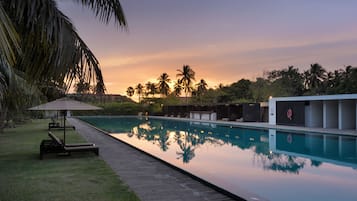 Outdoor pool, pool umbrellas, pool loungers