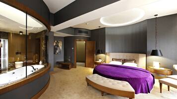 Suite Deluxe, vista al parque | Ropa de cama de alta calidad, edredón y artículos del minibar gratis