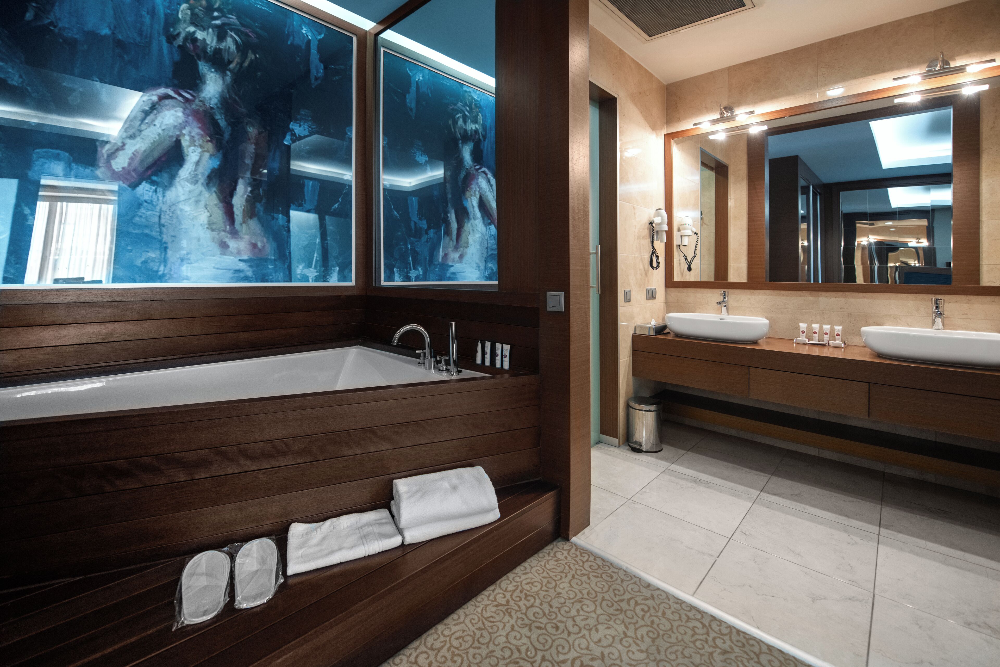 suite, 1 king bed, non smoking | bathroom | hair dryer, bathrobes, slippers, towels