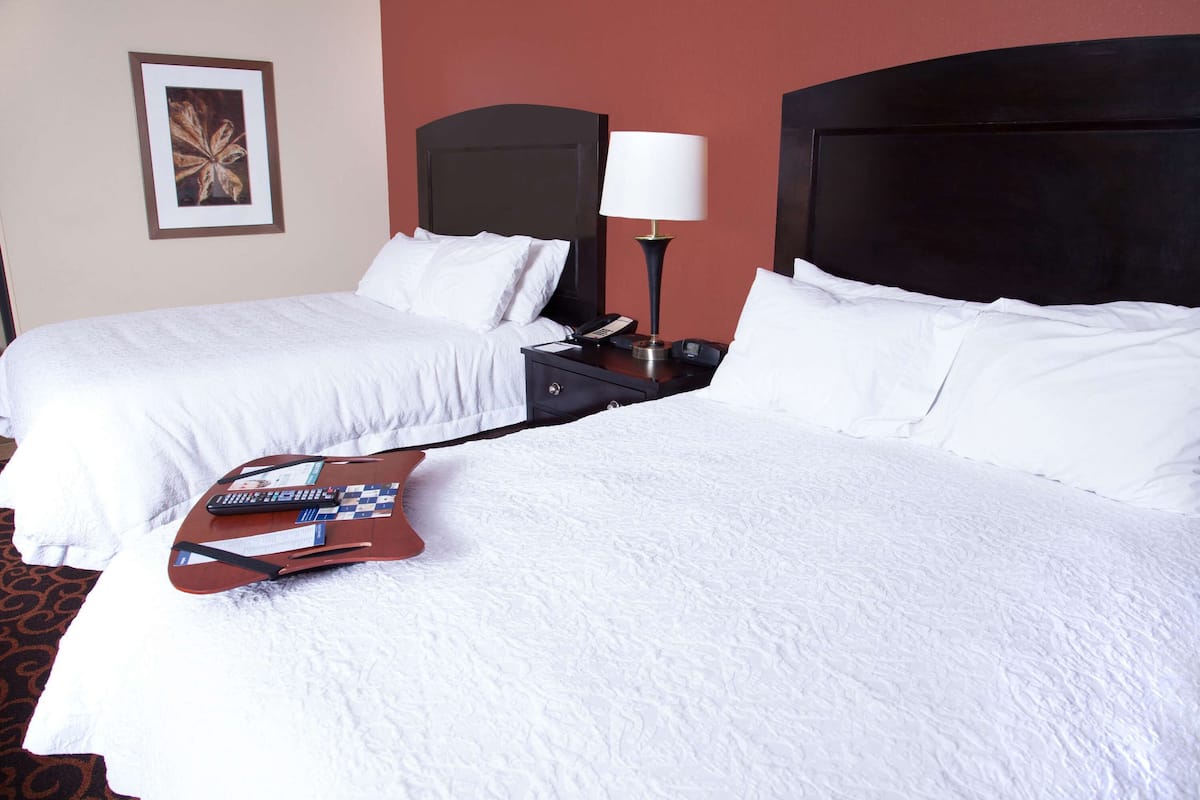 studio suite, 2 queen beds, non smoking | desk, iron/ironing board, free cots/infant beds, wifi