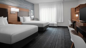 A hotel room with two beds, a desk, a chair, a TV, and a window with curtains. - TownePlace Suites Bridgeport Clarksburg (Clarksburg)