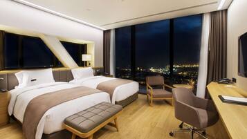 Premium bedding, down duvets, minibar, in-room safe