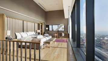 Premium bedding, down comforters, minibar, in-room safe