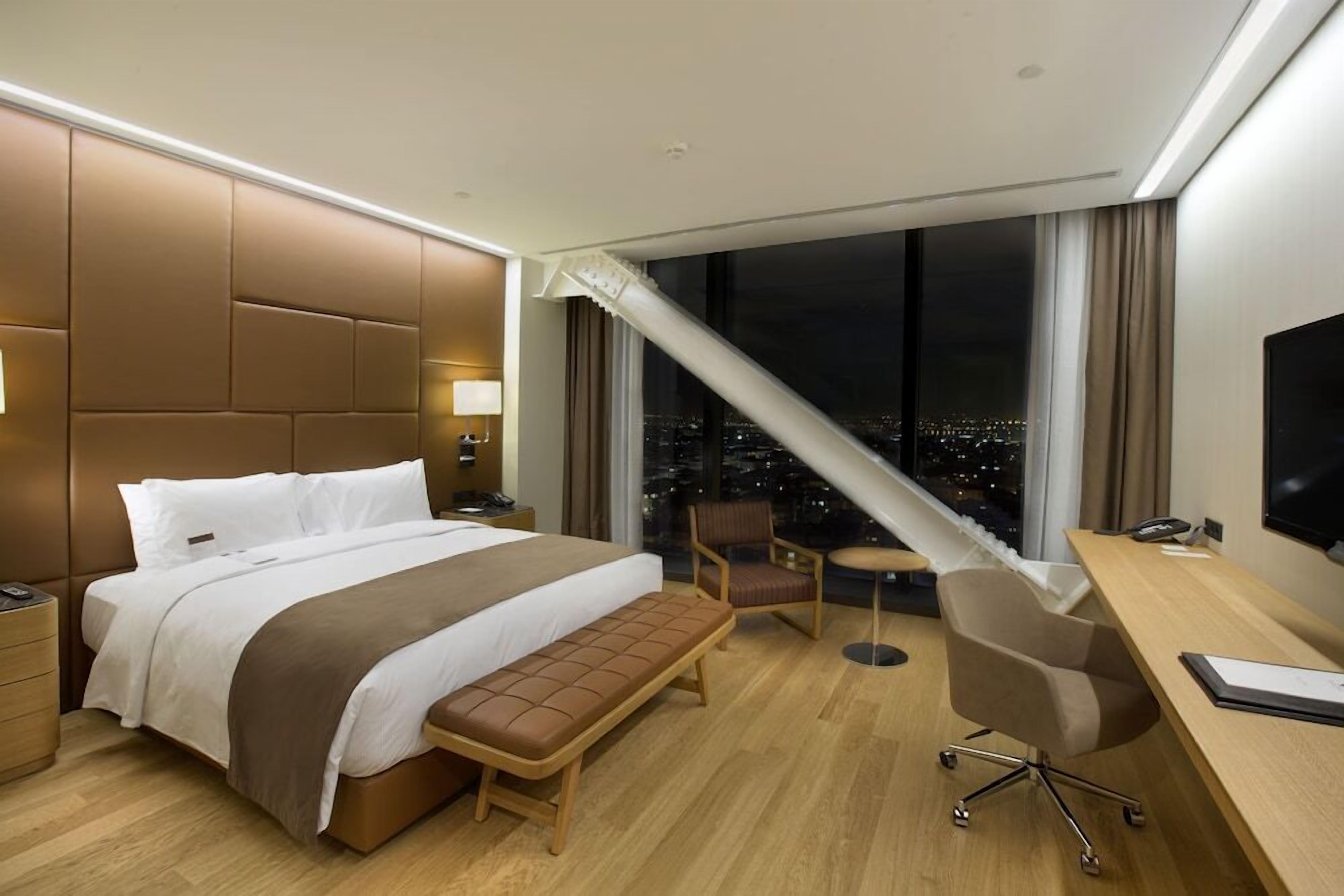 Premium bedding, down comforters, minibar, in-room safe