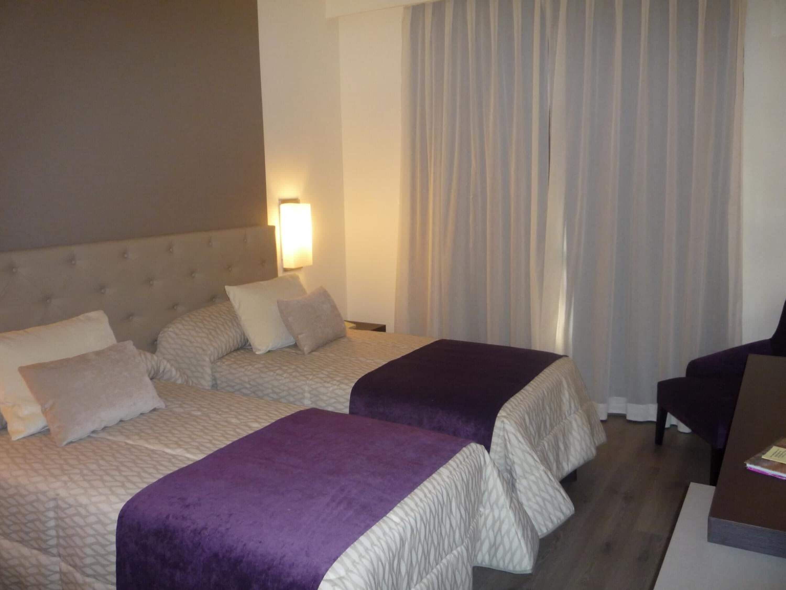 desk, blackout curtains, free wifi, bed sheets