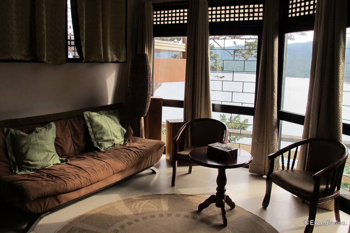 Sampaguita Suite | Living room | 32-inch flat-screen TV with cable channels, TV, DVD player