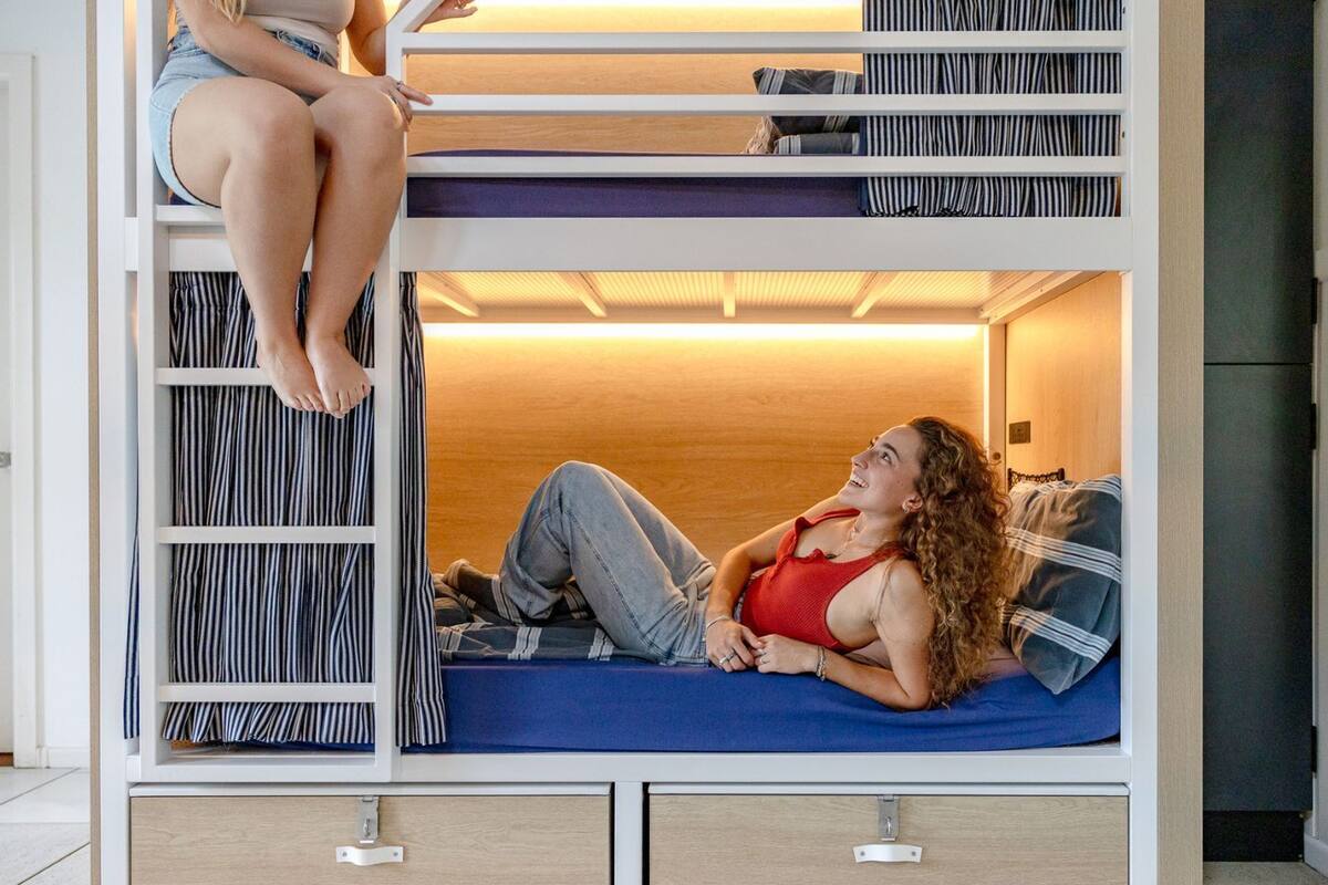 Bed in 6-Bed Female Dormitory Room | Blackout drapes, bed sheets