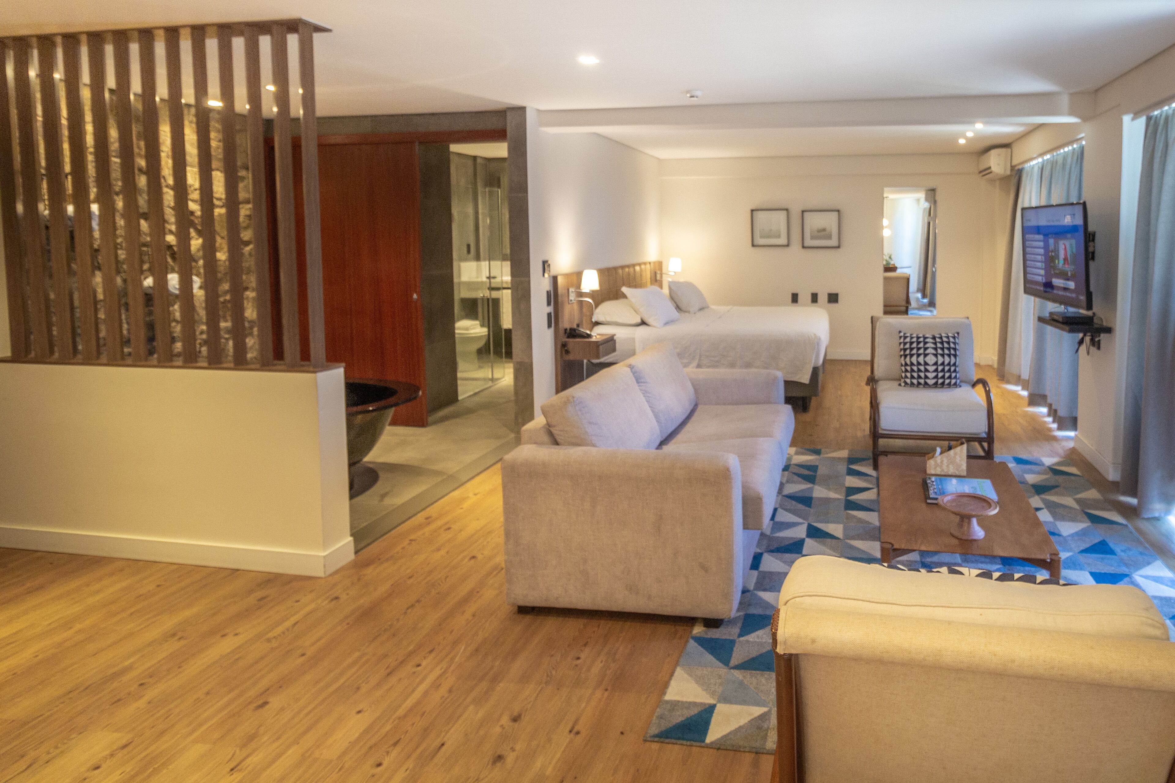 premium room, bathtub | 1 bedroom, minibar, in-room safe, desk