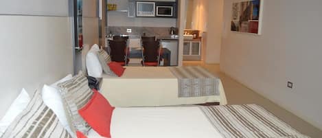 Standard Room | Minibar, in-room safe, individually decorated, individually furnished