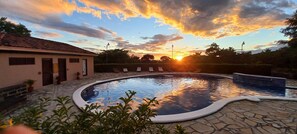 Outdoor pool, pool umbrellas, pool loungers - Villas de Palermo Hotel and Resort (San Juan del Sur)