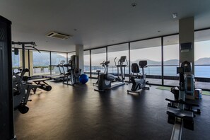 Work out with a scenic view at this gym, featuring treadmills, stationary bikes, and weightlifting equipment.
