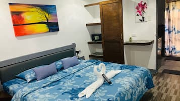 Appartamento Luxury, 1 letto king, vista oceano, lato piscina | Biancheria da letto ipoallergenica, una cassaforte in camera