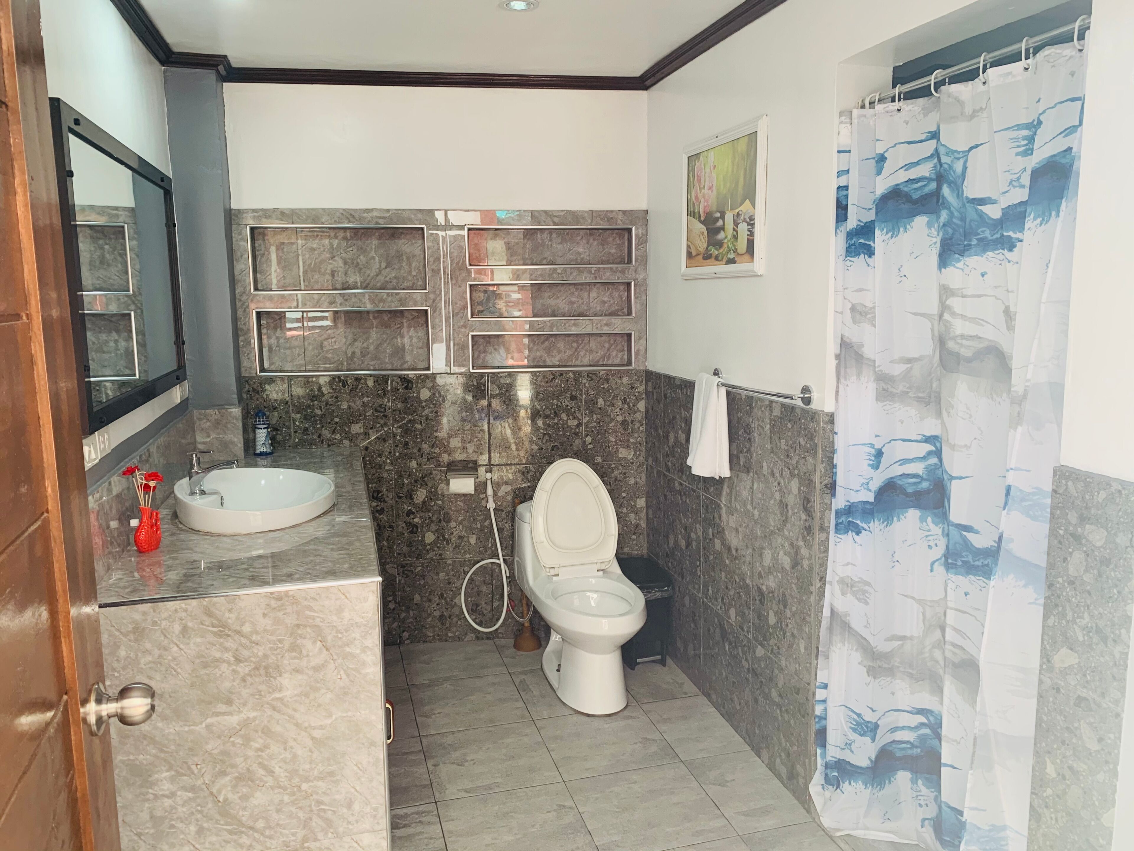 luxury condo, 1 king bed, ocean view, poolside | bathroom | shower, rainfall showerhead, free toiletries, bidet