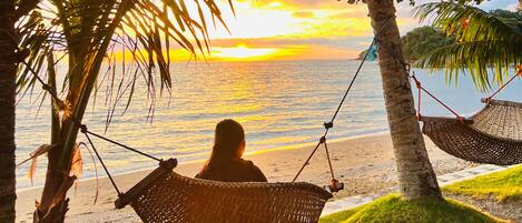 On the beach, sun loungers, beach towels, beach massages