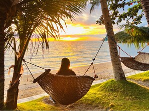 On the beach, sun-loungers, beach towels, beach massages