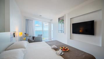 Suíte Master Premium Frente Mar Família | Frigobar, cofres nos quartos, escrivaninha