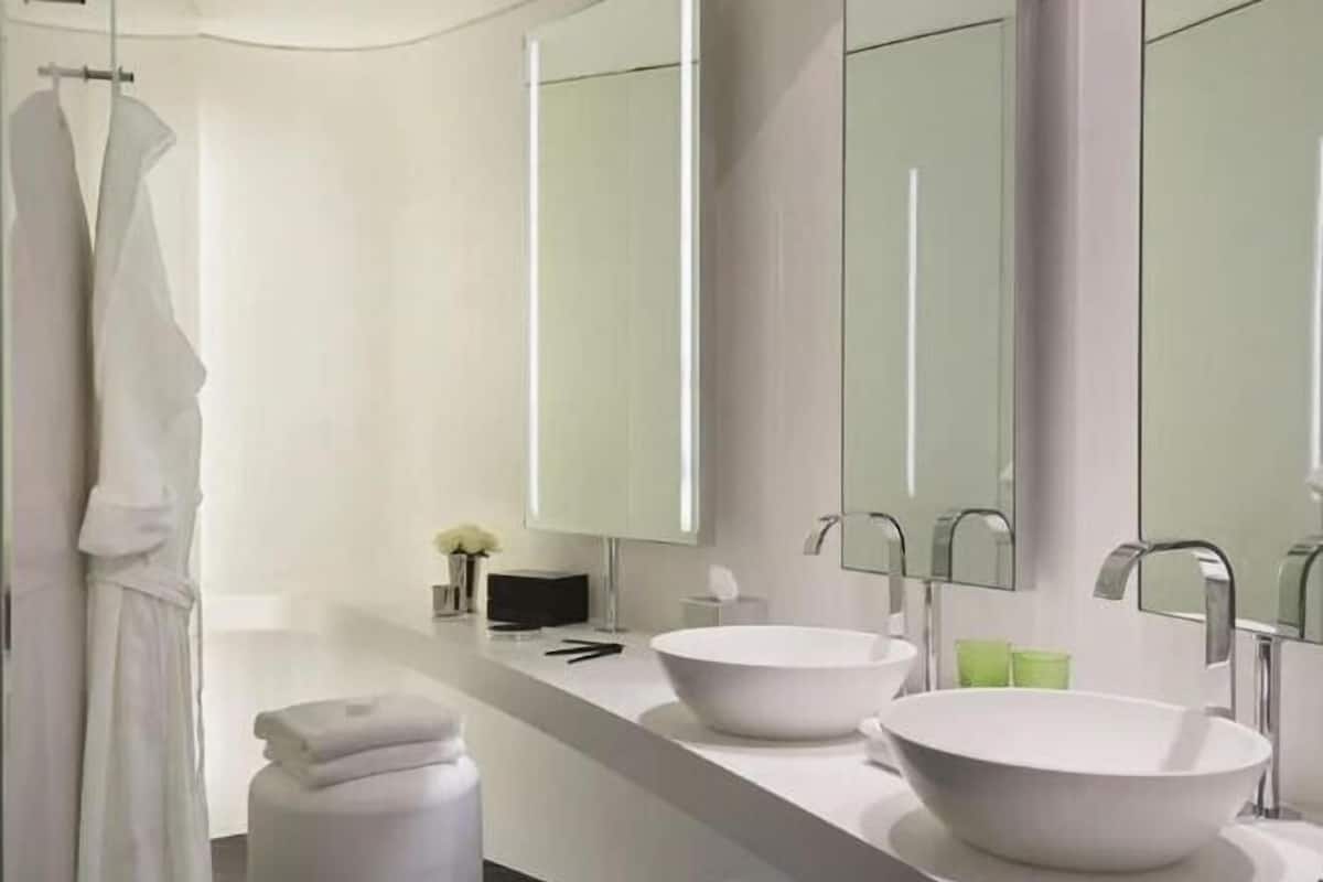 Designer toiletries, hair dryer, bathrobes, slippers