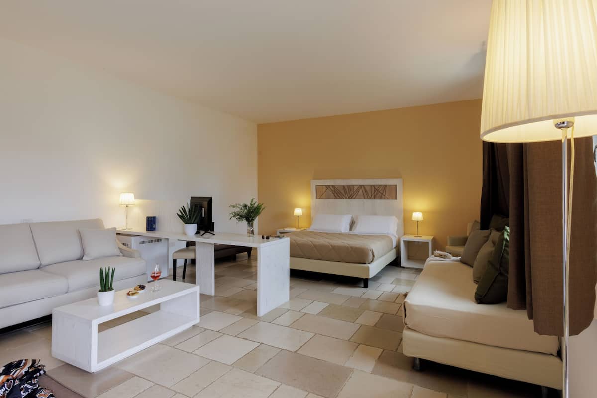 Habitació Deluxe | Roba de llit d'alta qualitat i matalassos amb encoixinament addicional 