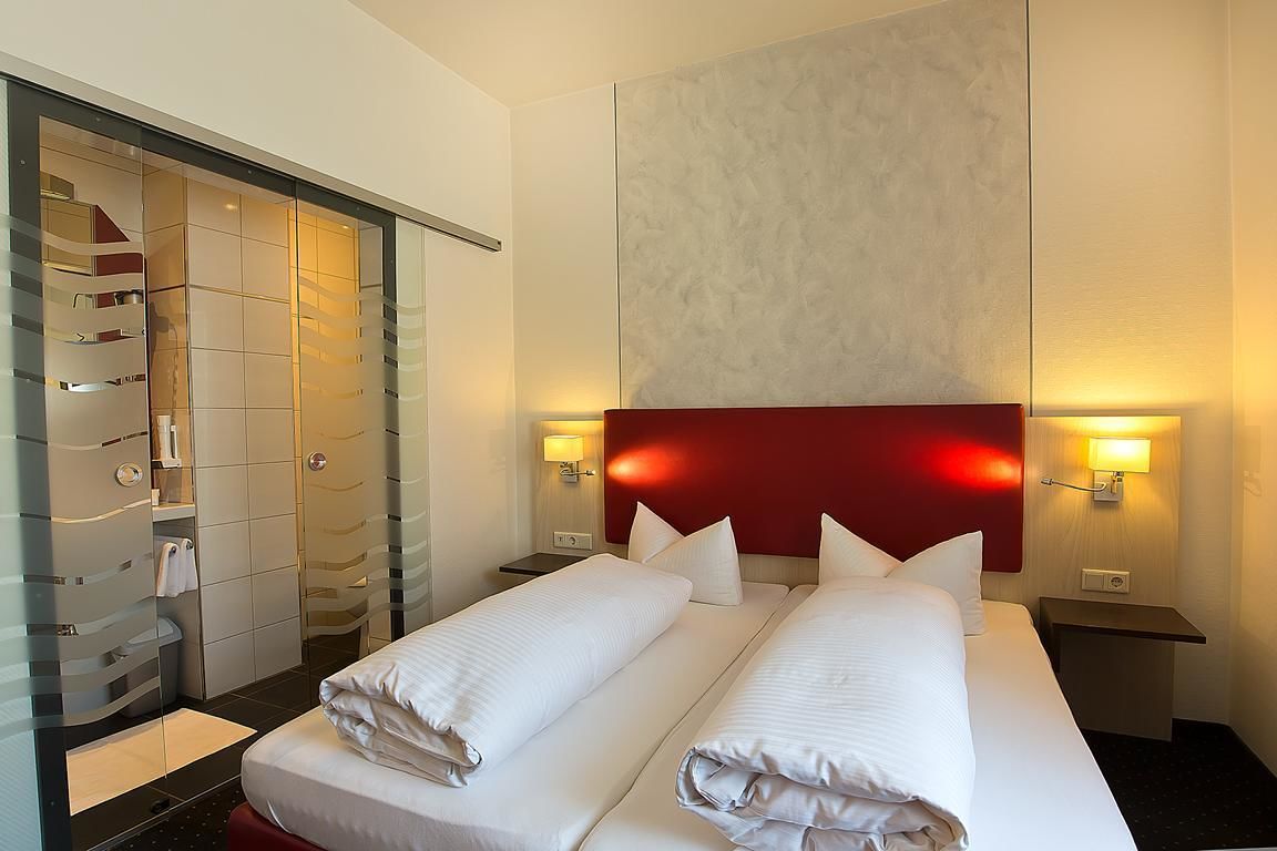 comfort double room, private bathroom | premium bedding, down duvets, pillow-top beds, minibar