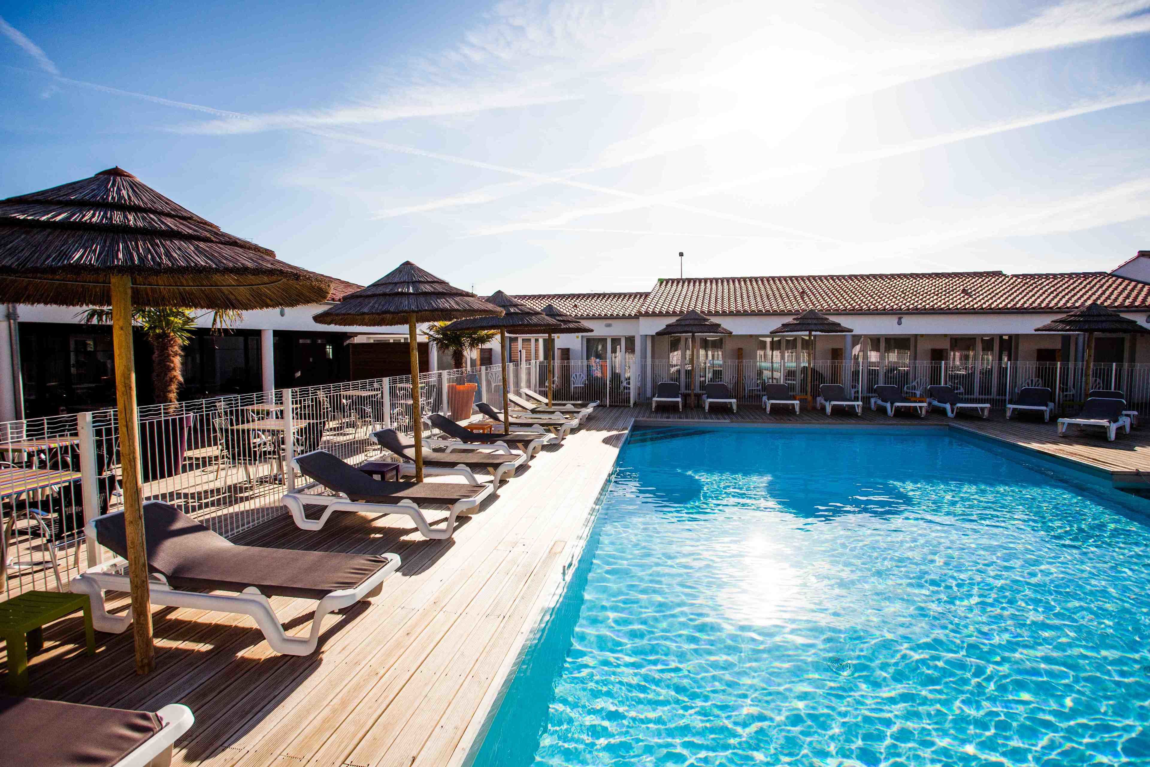 outdoor pool, pool loungers