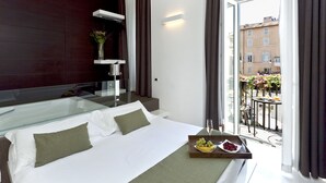 Suite | Egyptian cotton sheets, premium bedding, down comforters, minibar