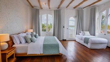 Suite, Sea View | Premium bedding, in-room safe, individually decorated, desk