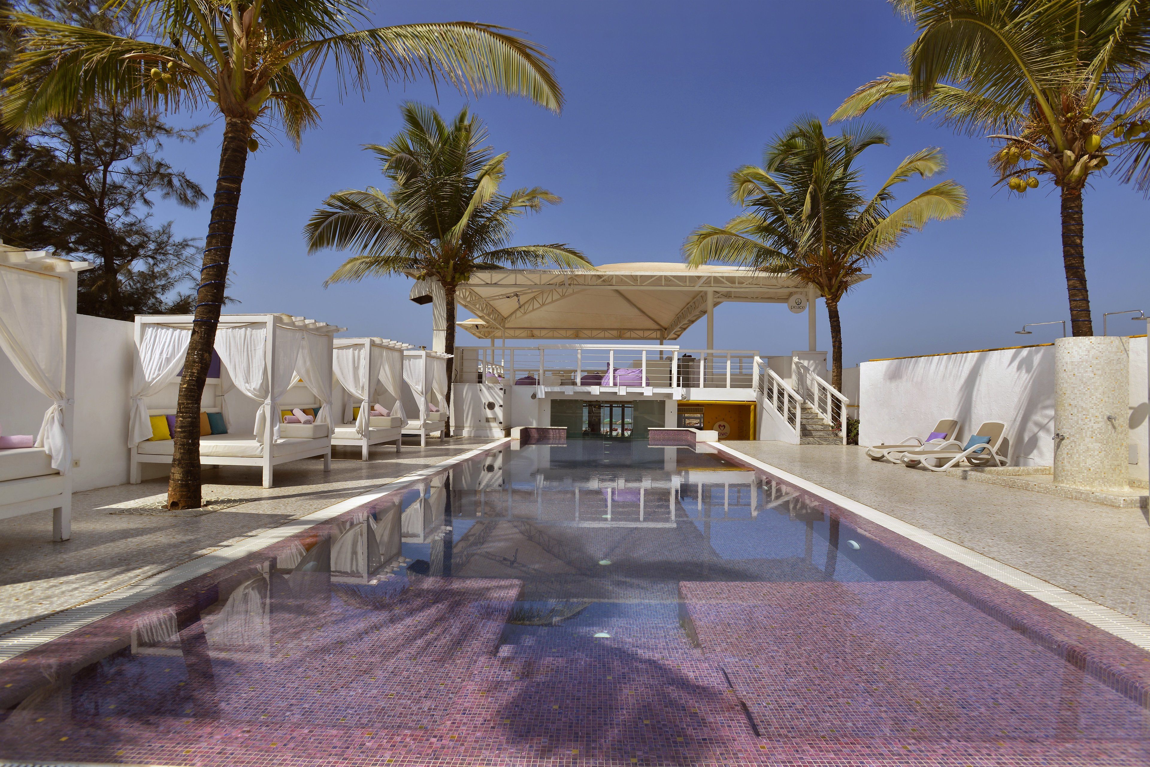 Outdoor pool, open 8:00 AM to 10:00 PM, free cabanas, sun loungers