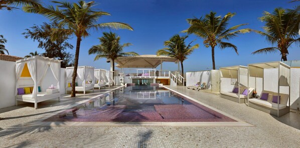 Outdoor pool, open 8:00 AM to 10:00 PM, free pool cabanas, pool loungers