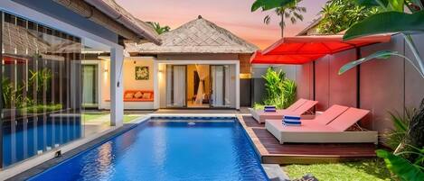 Outdoor pool, pool umbrellas, pool loungers