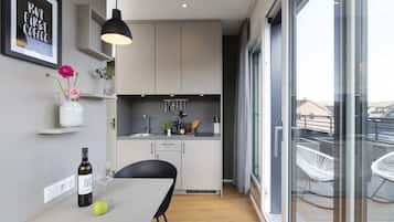 Apartment penthouse | Zona de estar | Televisión de pantalla plana de 46 pulgadas con canales digitales