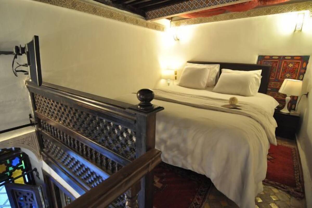 1 dormitorio y ropa de cama de alta calidad
