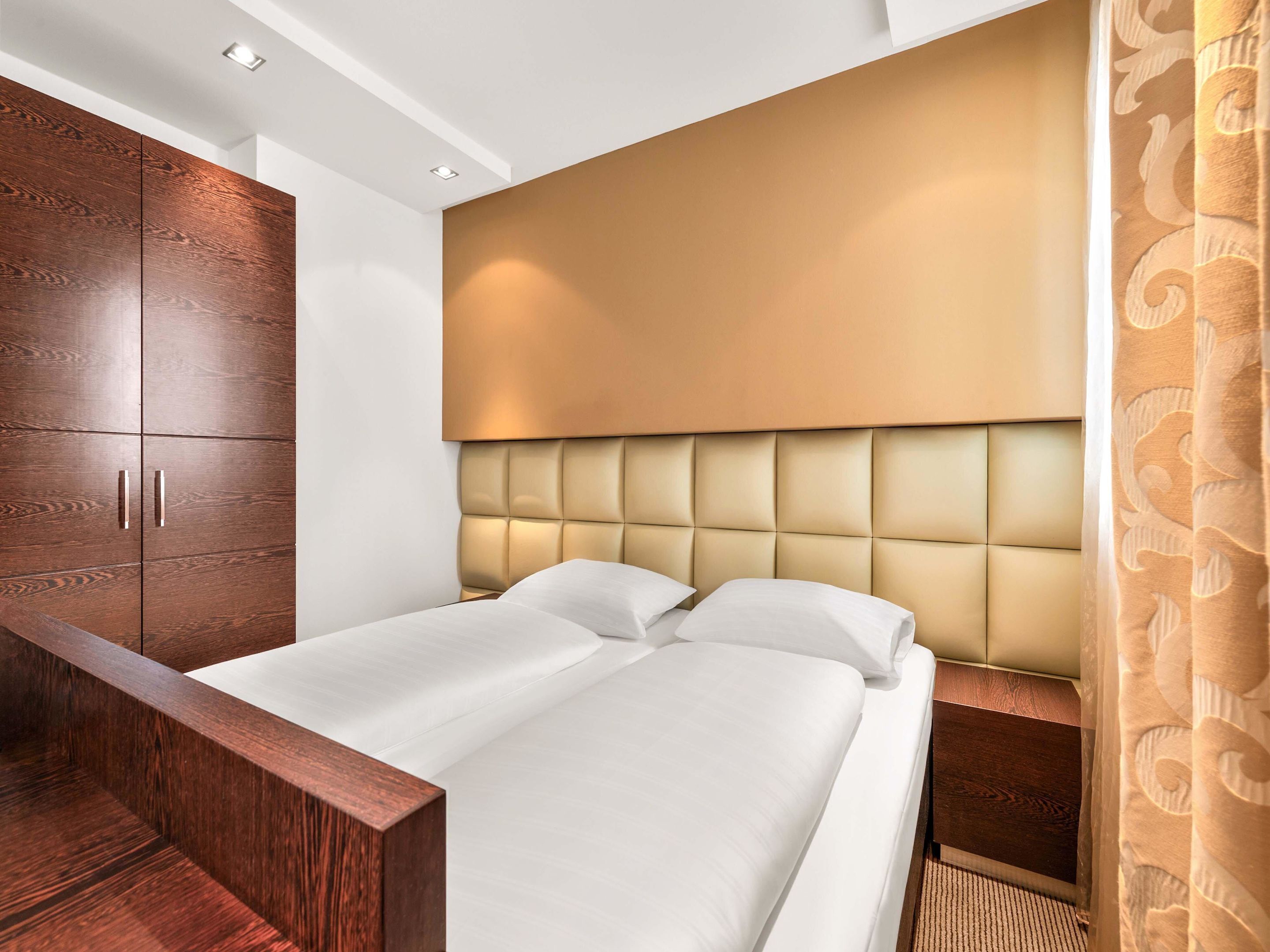 Hypo-allergenic bedding, desk, blackout drapes, soundproofing