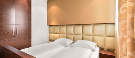 Hypo-allergenic bedding, desk, blackout drapes, soundproofing