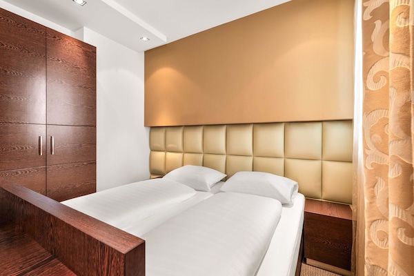 Hypo-allergenic bedding, desk, blackout drapes, soundproofing