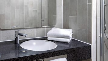 Shower, free toiletries, hair dryer, towels