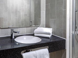 Shower, free toiletries, hair dryer, towels
