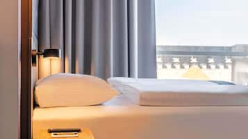 Hypo-allergenic bedding, desk, blackout drapes, soundproofing